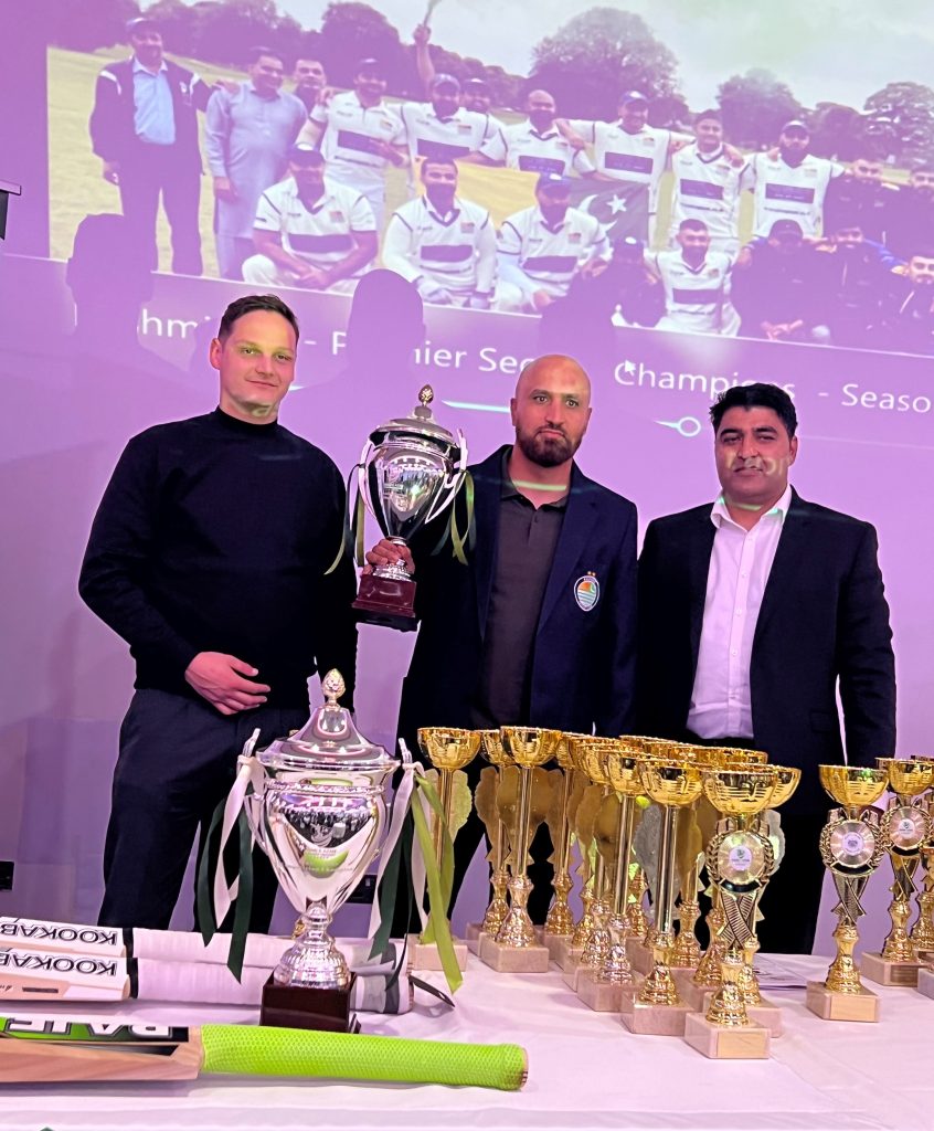 Ibrar Latif Captain of Kashmir CC collecting the third consecutive Premier Section Championship Title