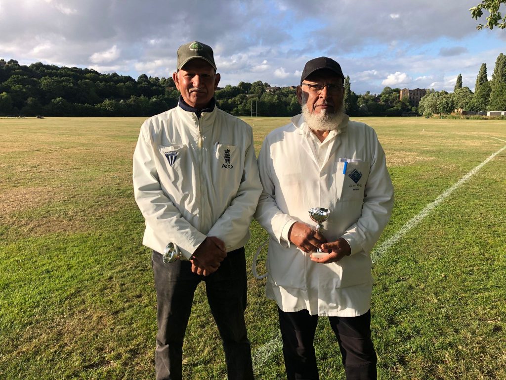 Umpires Shabbir Ahmed and Miya Mohammed Loonat